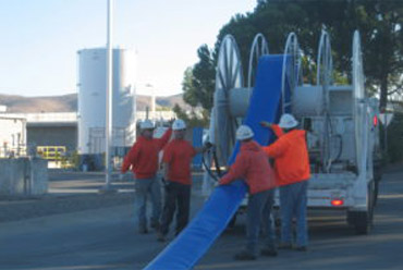 Workers pulling the pipe